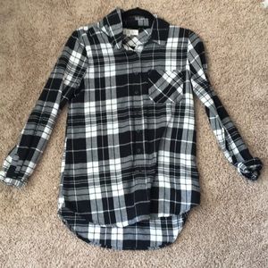 I am selling a black and white Plaid overcoat